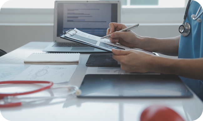 a person holding a pen and a clipboard