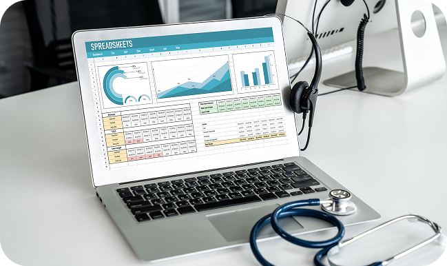 a laptop with headphones and a stethoscope